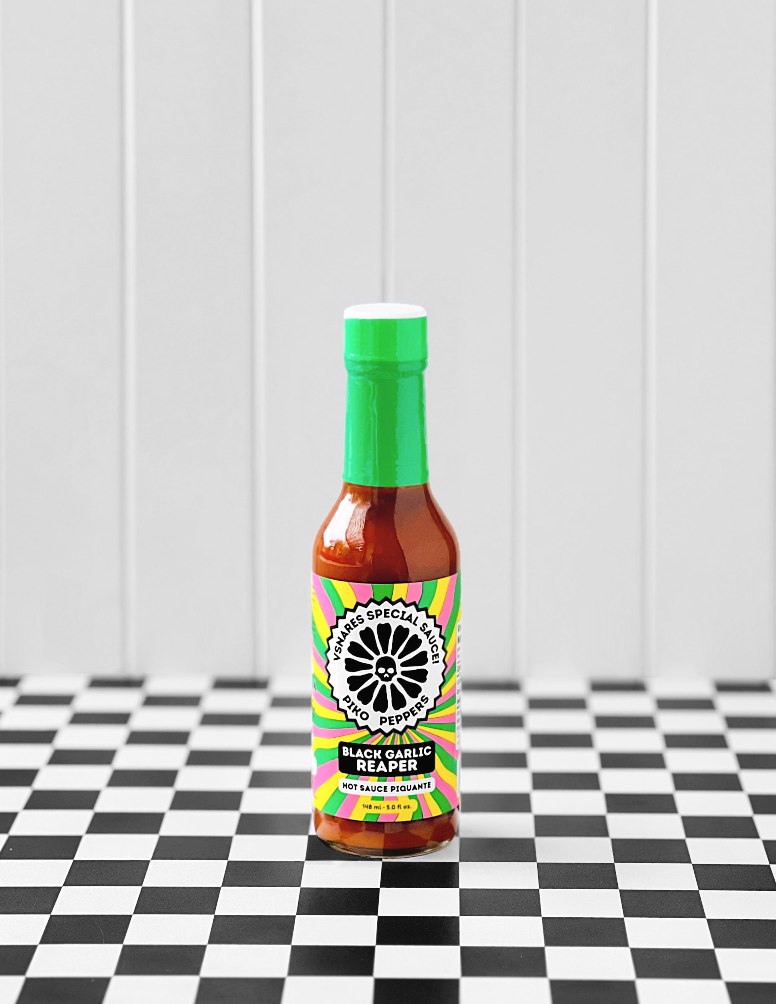 piko-peppers-sauce-sp-ciale-vsnares-sauce-piquante-ail-noir-reaper image 1